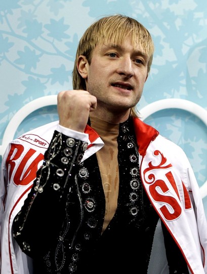 Plushenko of Russia reacts after his routine in the men's short programme figure skating competition at the Vancouver 2010 Winter Olympics